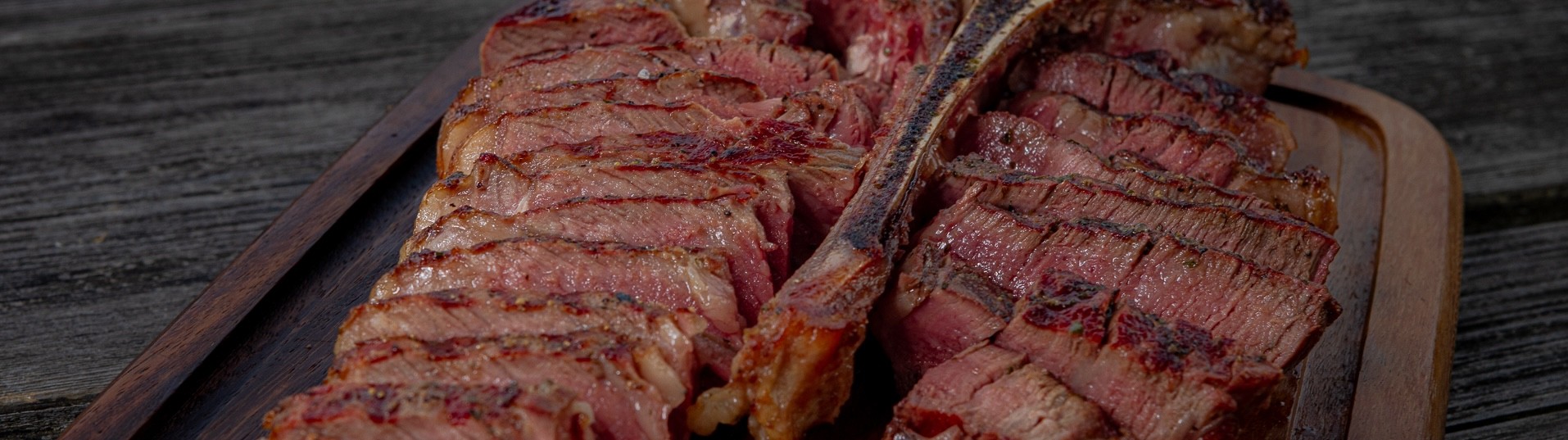 Porterhouse USDA Prime Black Angus met kruidenboter